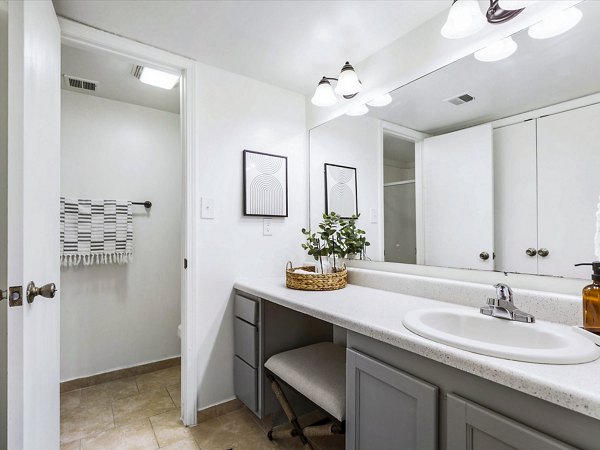 Bedroom featuring modern design and stylish decor at Parc at 21st & Rock Apartments