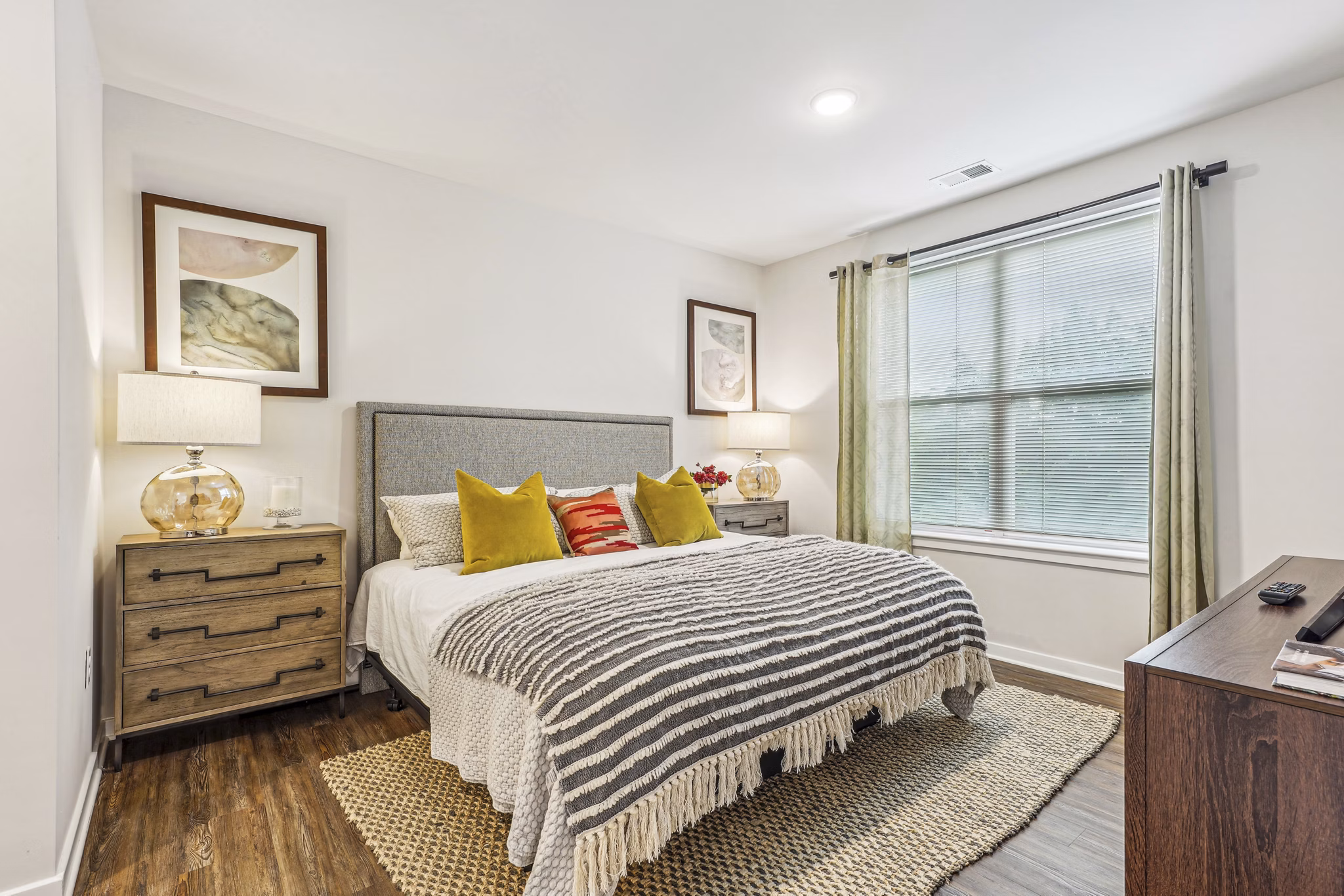 Cozy bedroom featuring modern decor at Liberty Bay Club Apartments