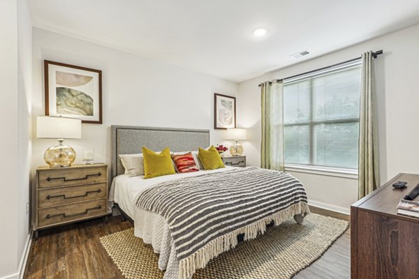 Cozy bedroom featuring modern decor at Liberty Bay Club Apartments