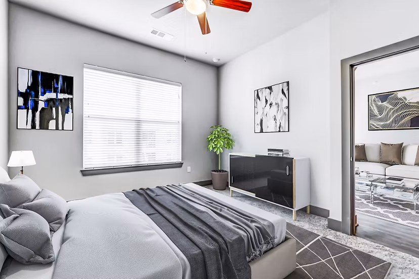 Cozy bedroom with modern furnishings at Shoreview Flats Apartments