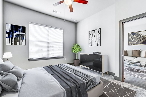 Cozy bedroom with modern furnishings at Shoreview Flats Apartments
