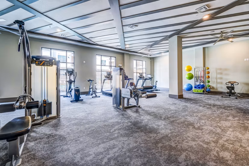 State-of-the-art fitness center at Shoreview Flats Apartments featuring modern equipment and spacious workout areas