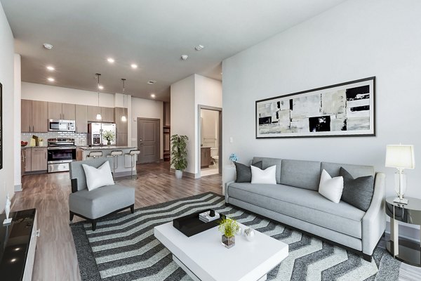 Modern living room with city views at Shoreview Flats Apartments