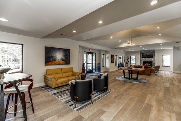 Elegant clubhouse lobby with contemporary decor at Wellington Apartments, showcasing luxury living spaces in a premier location