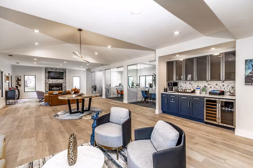 Welcoming clubhouse lobby with modern seating and decor at Wellington Apartments