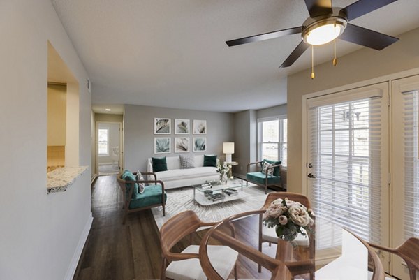 Dining area with modern furniture and stylish lighting at Wellington Apartments