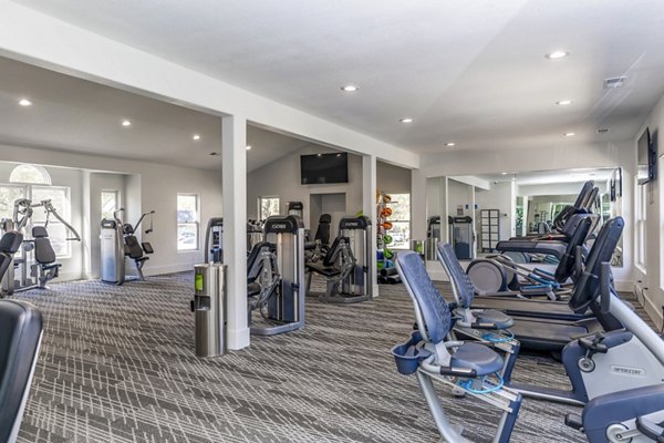 Fitness center with modern equipment at Wellington Apartments