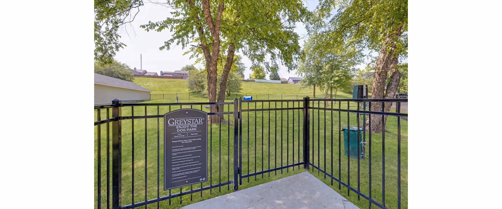 Dog park with agility course at Wellington Apartments, perfect for pet owners in luxury living environments
