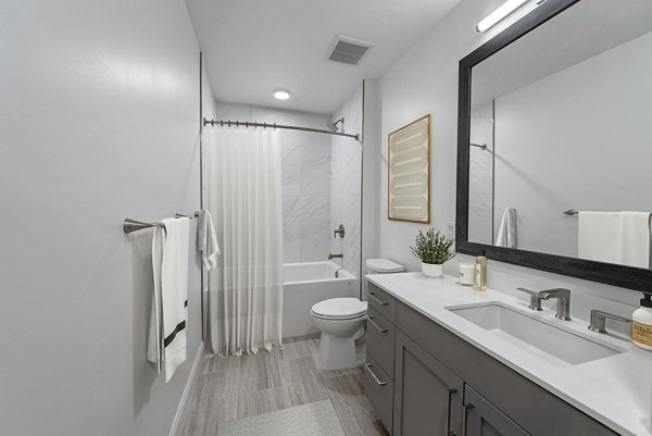 Luxury bathroom with modern fixtures at Novel Turtle Creek Apartments