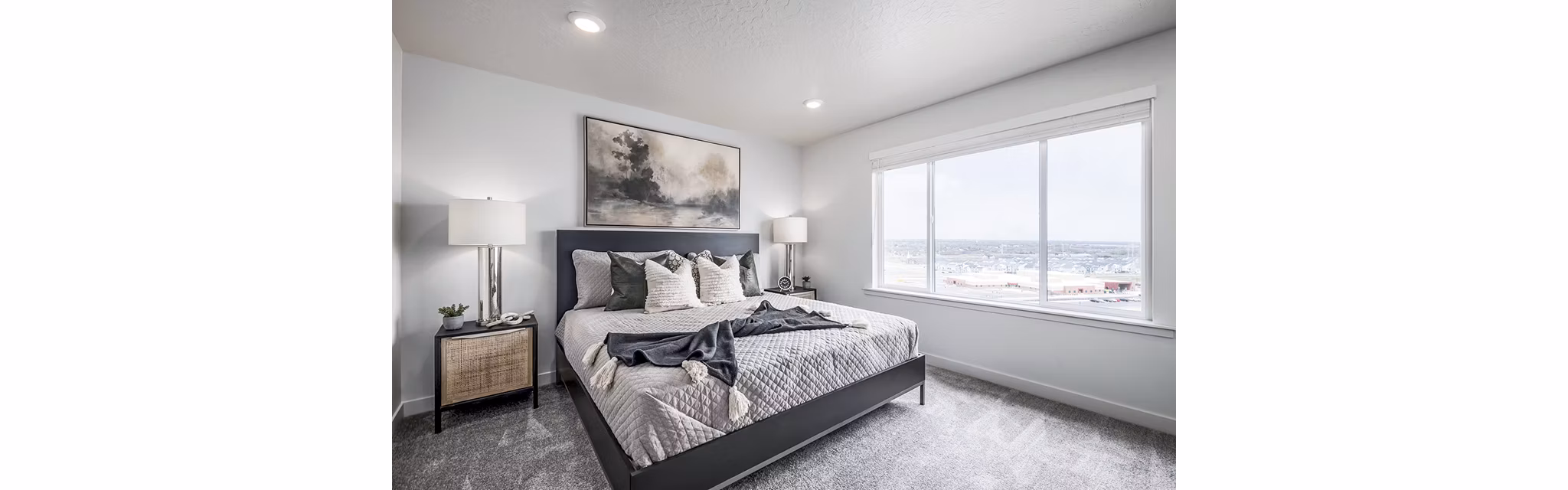 Cozy bedroom with contemporary design elements at Banner Hill Apartments