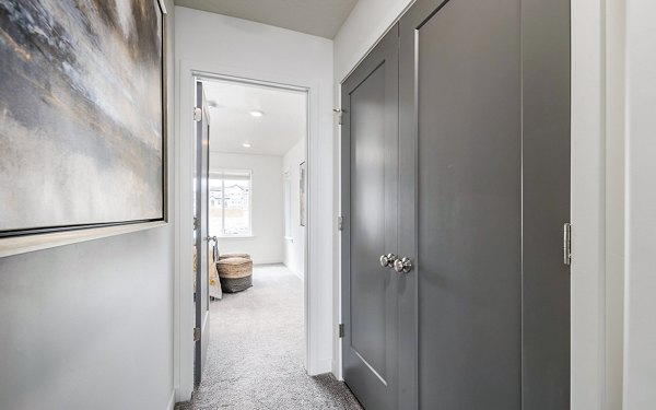 Contemporary hallway with modern lighting at Banner Hill Apartments, showcasing sleek design in a luxury apartment community