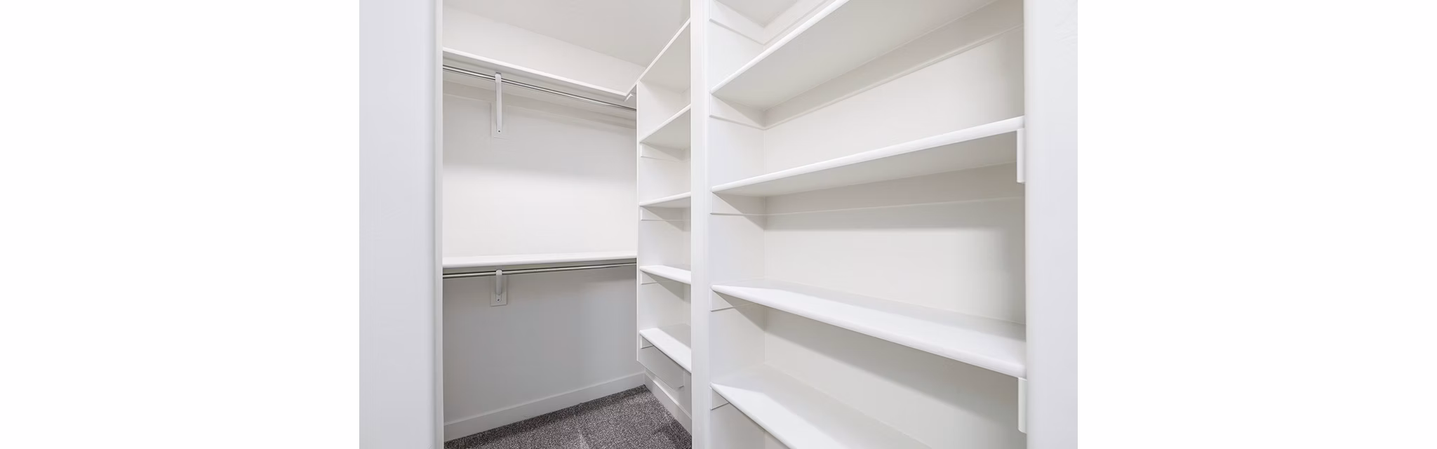 Cozy bedroom with modern decor at Banner Hill Apartments, offering luxury living in Baltimore