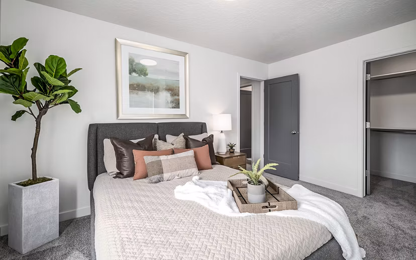 Stylish bedroom with modern furnishings at Banner Hill Apartments, offering a luxurious living experience in the city
