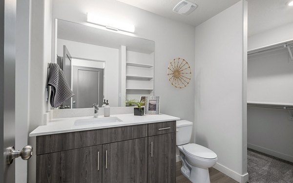Bathroom with sleek fixtures and elegant lighting at Banner Hill Apartments in Baltimore, offering luxurious and modern living spaces