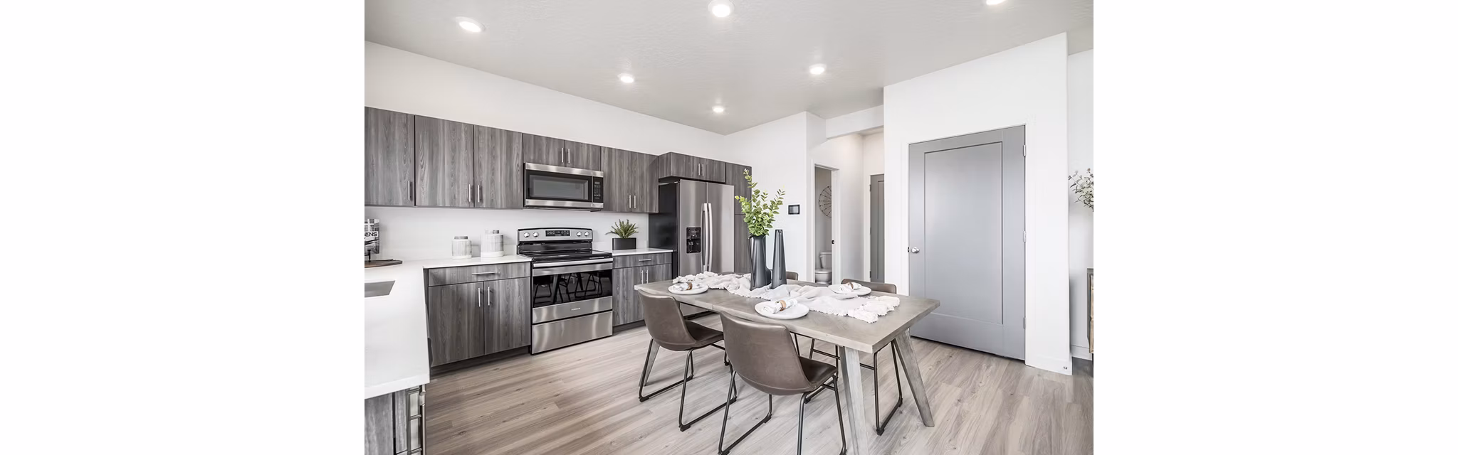 Dining room featuring elegant decor and natural light in Banner Hill Apartments