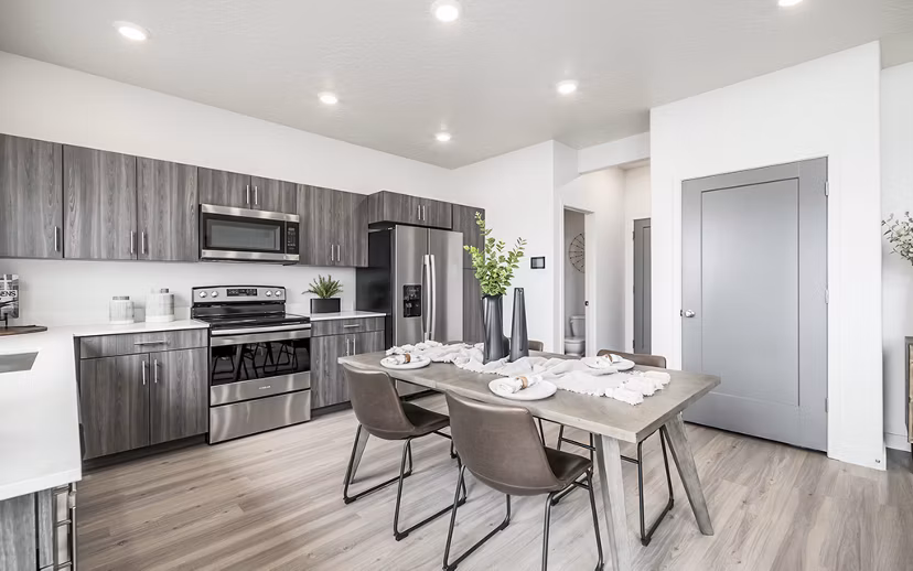 Dining room featuring elegant decor and natural light in Banner Hill Apartments