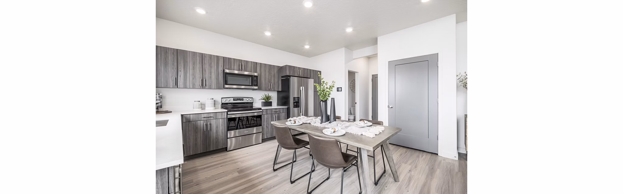 Dining room featuring elegant decor and natural light in Banner Hill Apartments