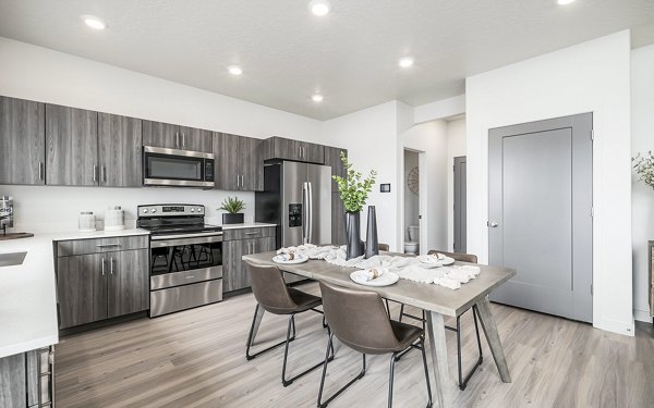Dining room featuring elegant decor and natural light in Banner Hill Apartments