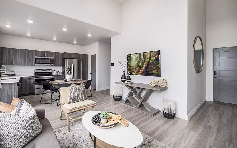 Modern living room with cozy seating and sleek decor at Banner Hill Apartments