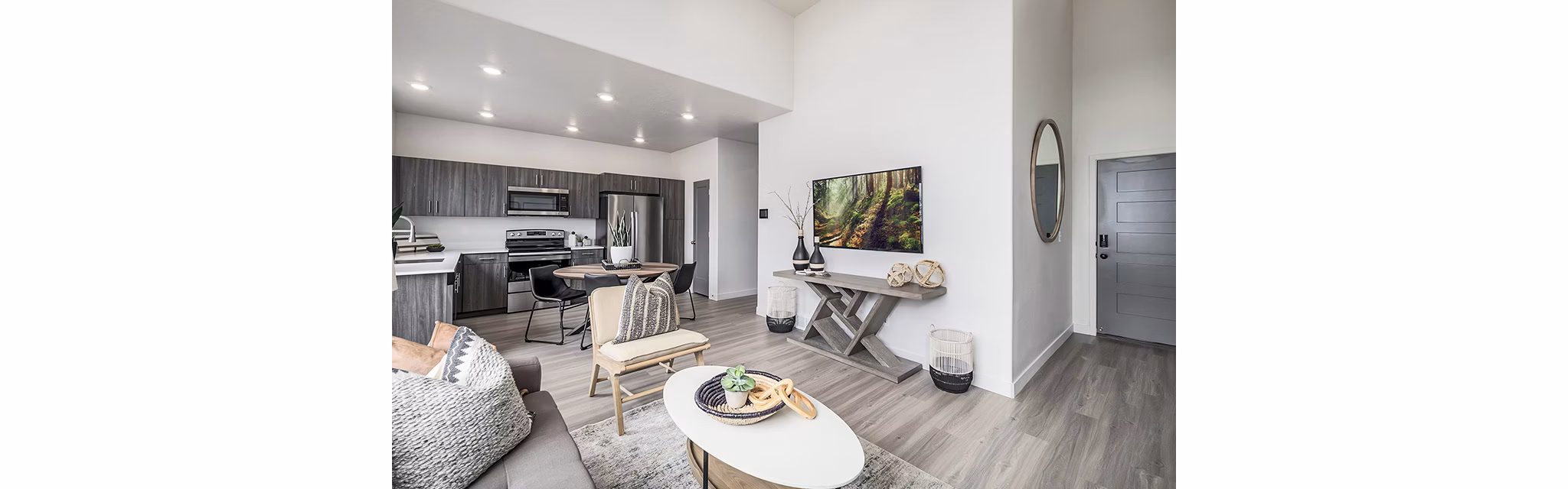 Modern living room with cozy seating and sleek decor at Banner Hill Apartments