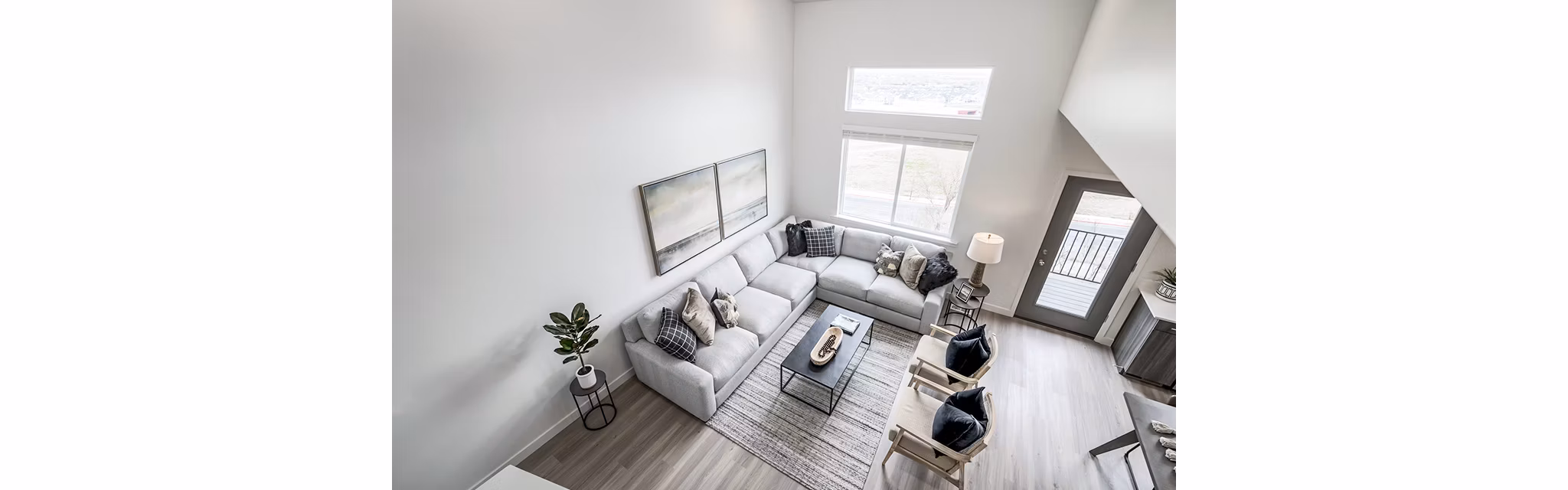 Spacious living room with contemporary decor at Banner Hill Apartments, offering comfort and style in a vibrant urban setting