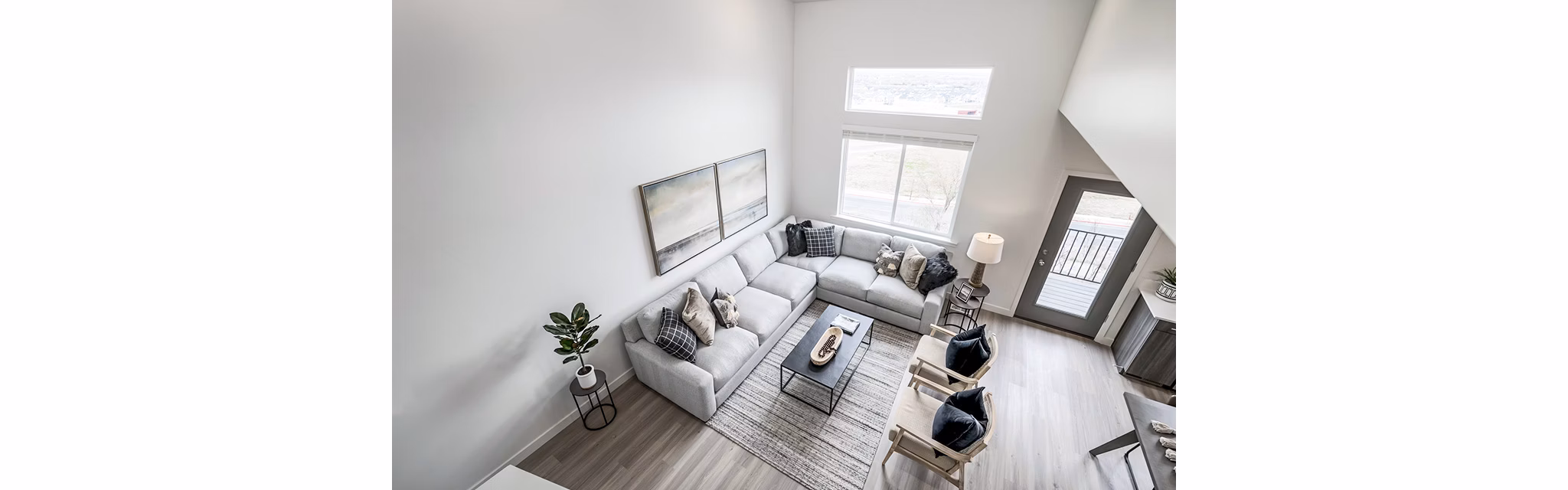 Spacious living room with contemporary decor at Banner Hill Apartments, offering comfort and style in a vibrant urban setting