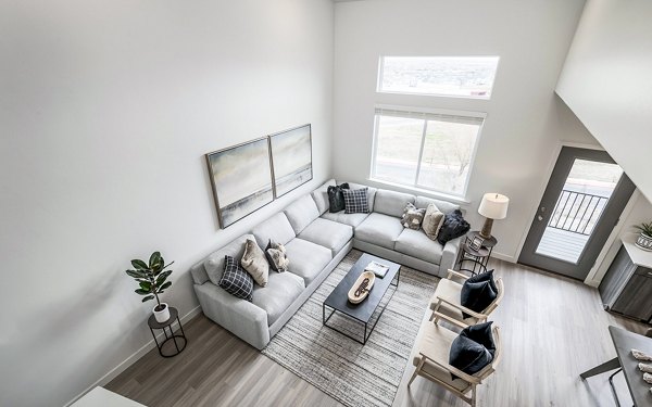 Spacious living room with contemporary decor at Banner Hill Apartments, offering comfort and style in a vibrant urban setting