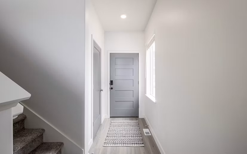 Contemporary hallway with sleek lighting fixtures at Banner Hill Apartments in downtown Baltimore