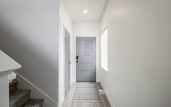Contemporary hallway with sleek lighting fixtures at Banner Hill Apartments in downtown Baltimore