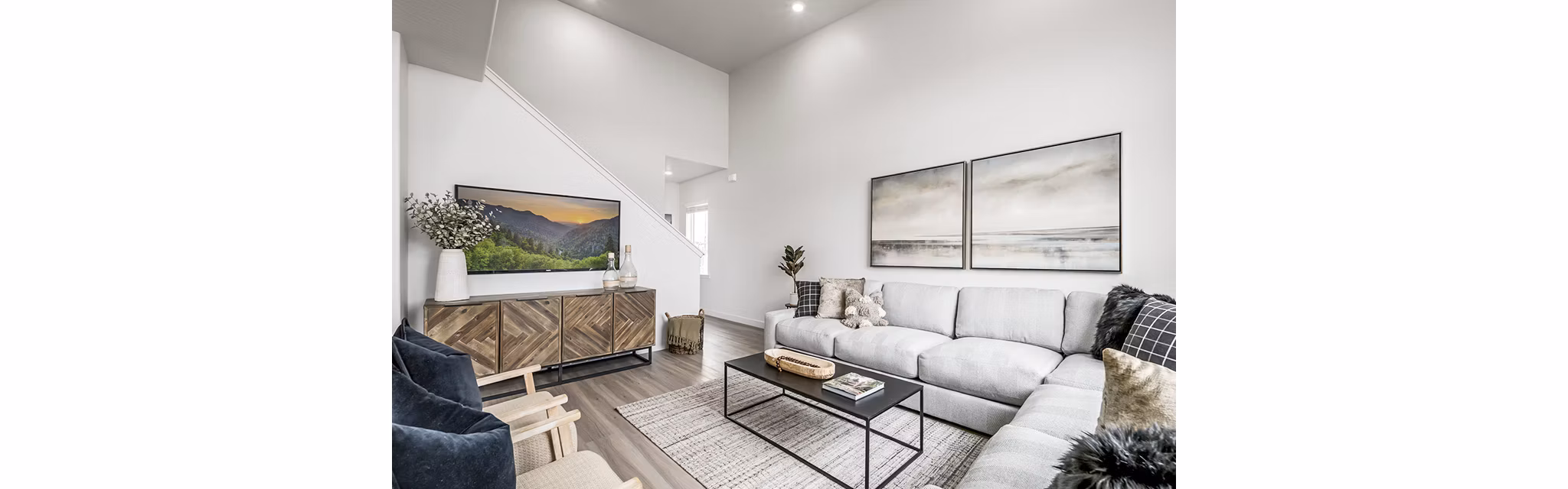 Spacious living room with modern decor in Banner Hill Apartments