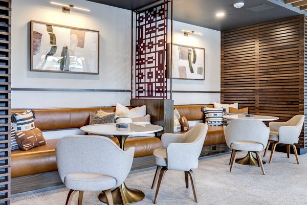 Clubhouse featuring modern lounge and seating areas at Broadstone Vin Apartments