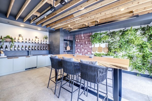 Clubhouse featuring modern design and plush seating at Broadstone Vin Apartments Perfect for gatherings and social events