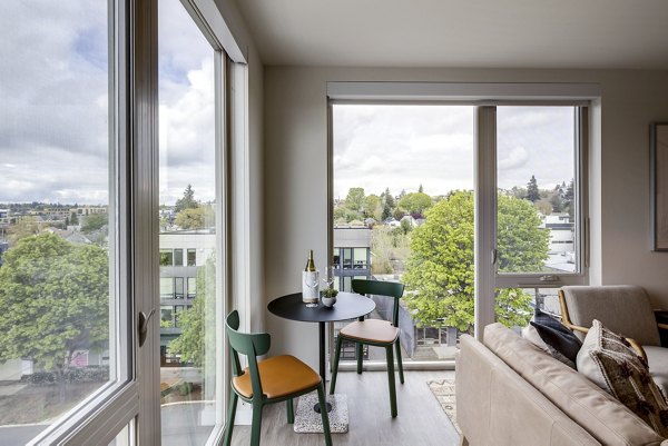 Cozy living room with modern decor at Broadstone Vin Apartments