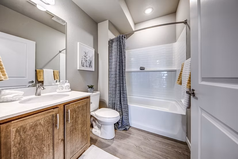 Bathroom featuring modern fixtures and clean design at The Bend at Highland Meadows Apartments Ideal luxury living in Colorado