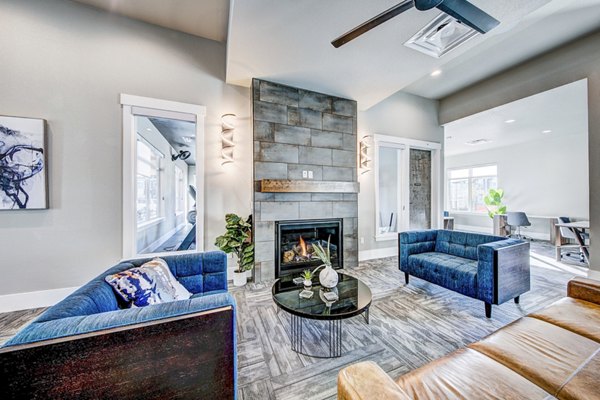 Clubhouse lobby with modern decor at The Bend at Highland Meadows Apartments