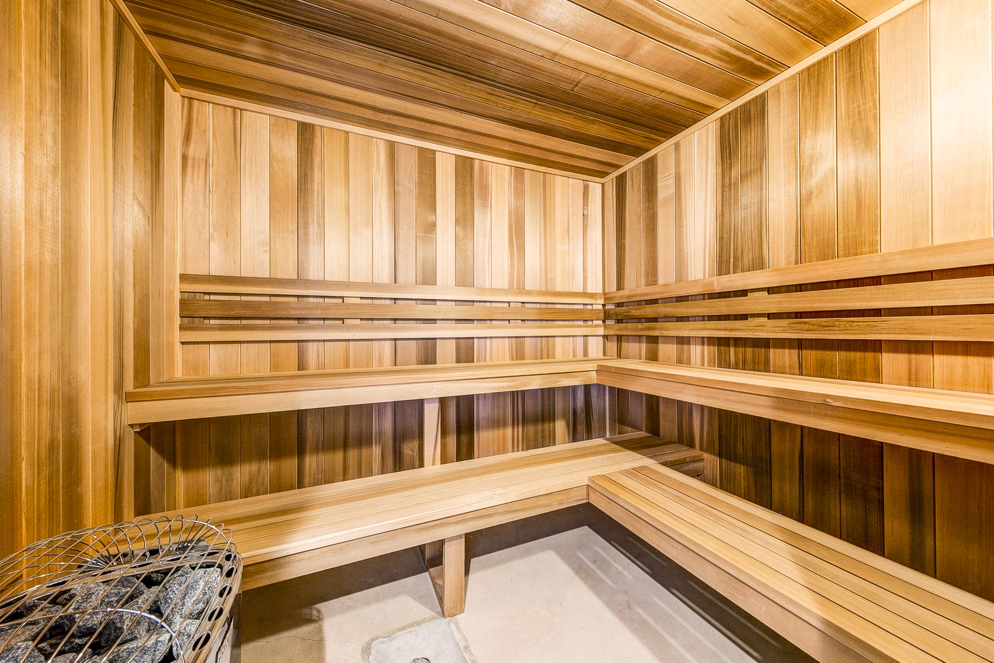 Relaxing sauna at The Bend at Highland Meadows Apartments, featuring soothing wood interiors and modern amenities for ultimate comfort
