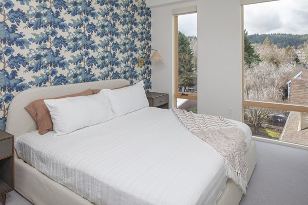 Cozy bedroom featuring a modern design at The Fitz Apartments