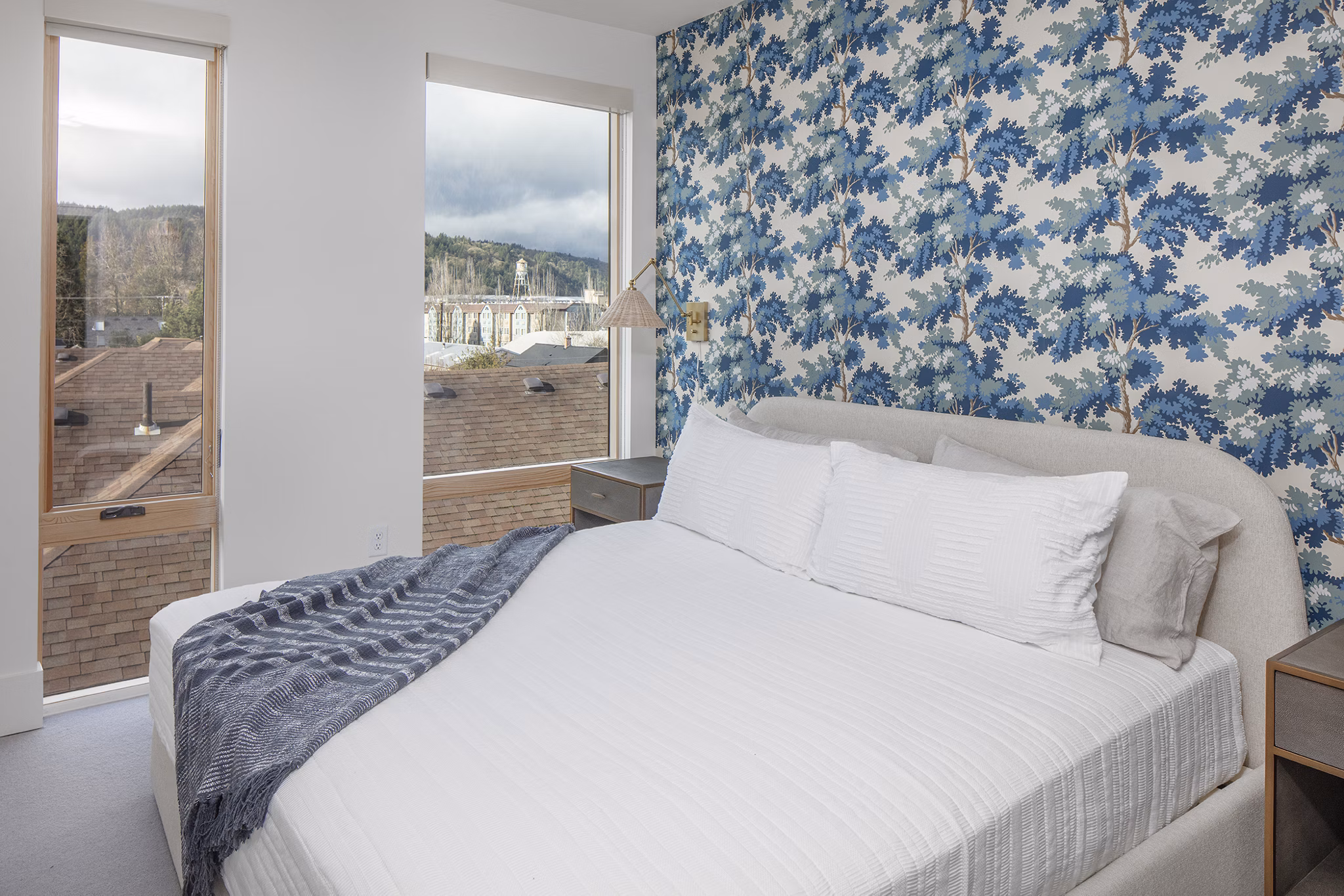 Modern master bedroom featuring elegant decor at The Fitz Apartments