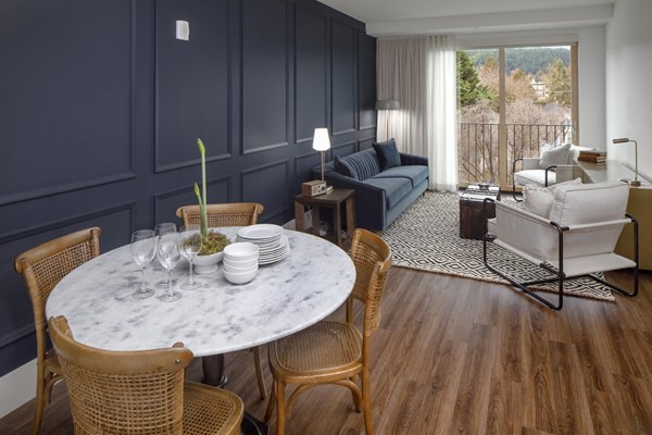 Modern dining area with contemporary furnishings in The Fitz Apartments