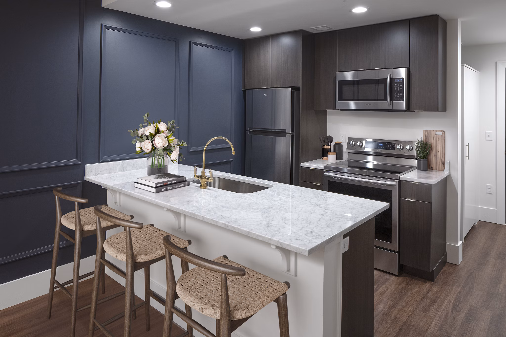 Spacious kitchen with modern appliances at The Fitz Apartments
