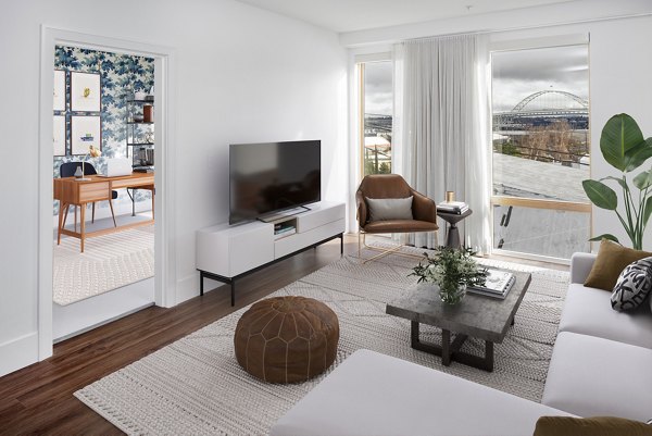 Stylish living room with contemporary furnishings at The Fitz Apartments