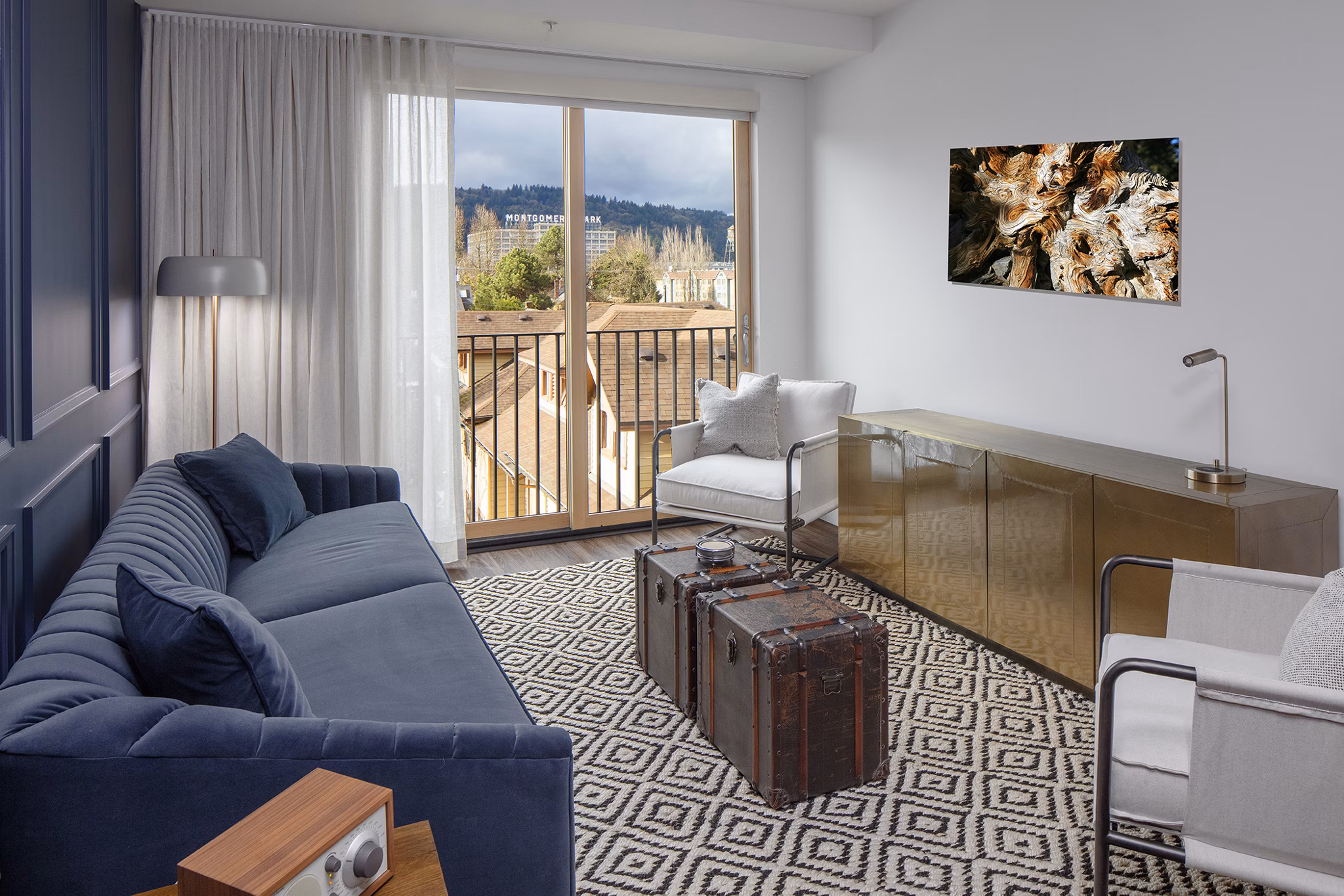 Cozy living room with contemporary furnishings in The Fitz Apartments, a Greystar luxury property