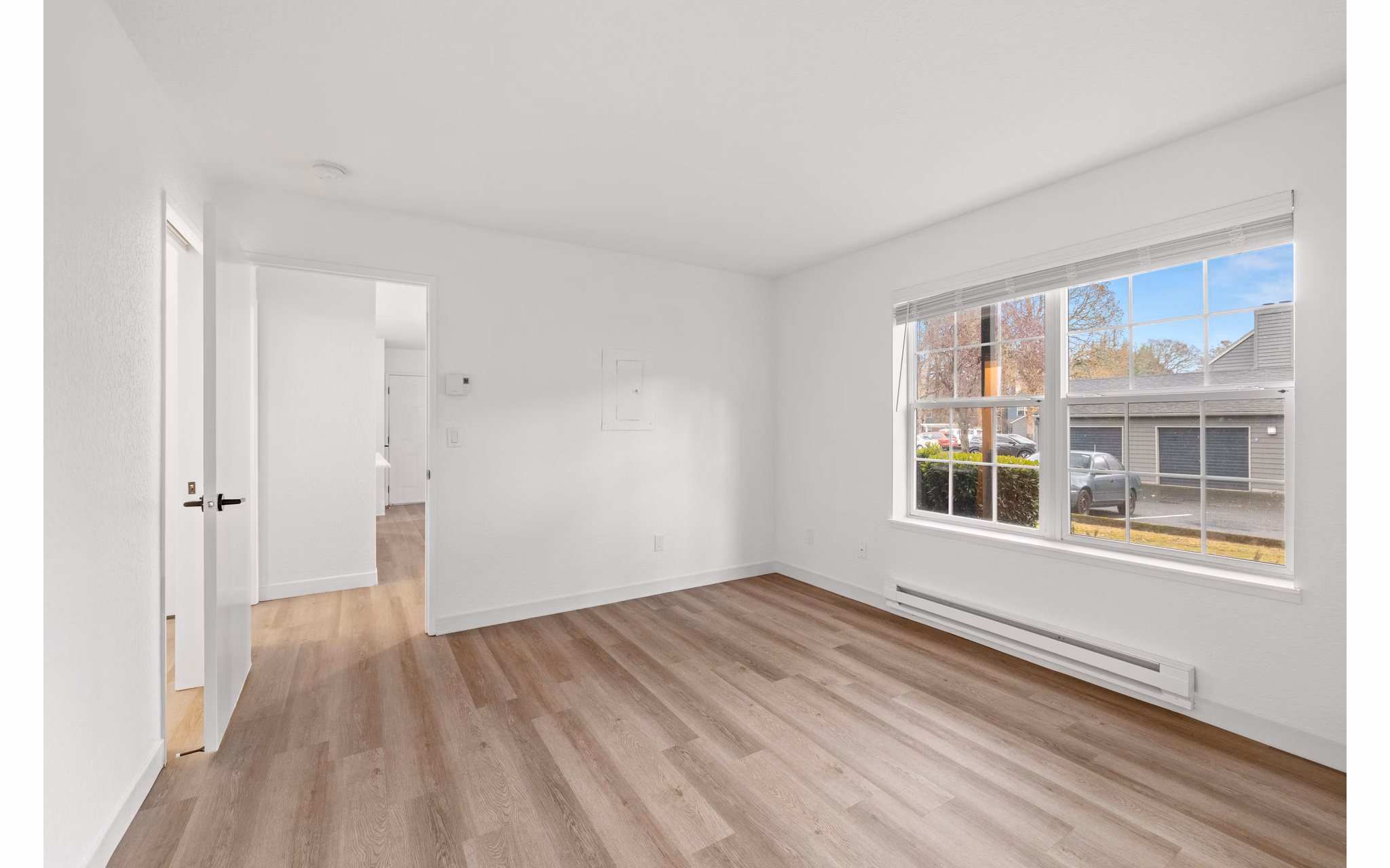 Cozy bedroom with sleek furnishings at Larkspur Place Apartments