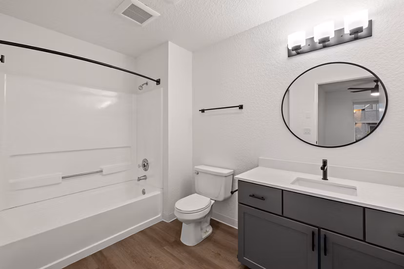 Bathroom featuring elegant marble countertops at Larkspur Place Apartments