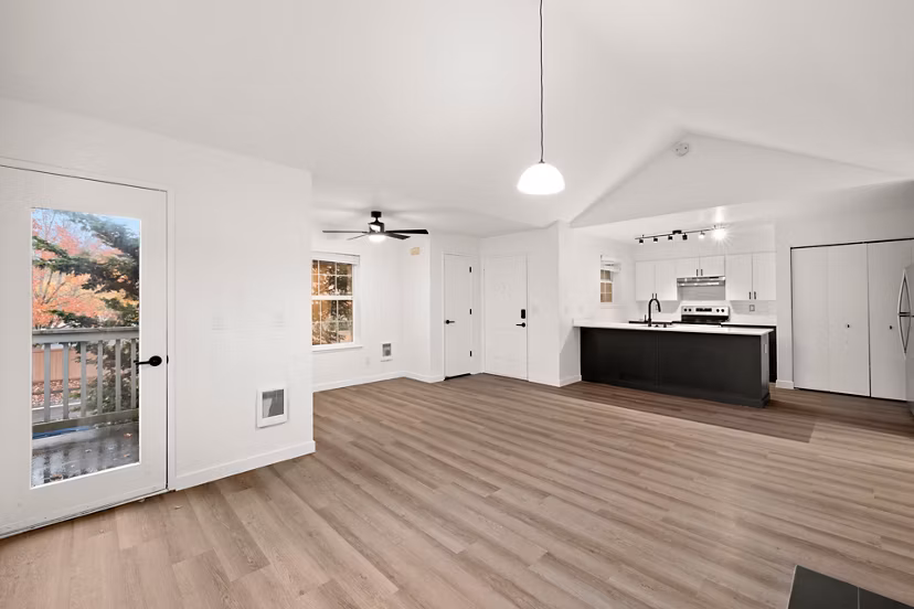 Modern kitchen with stainless steel appliances at Larkspur Place Apartments