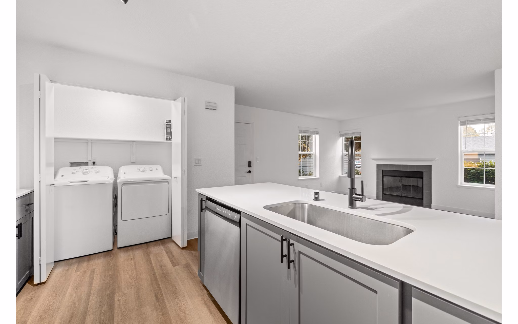Modern kitchen with stainless steel appliances at Larkspur Place Apartments