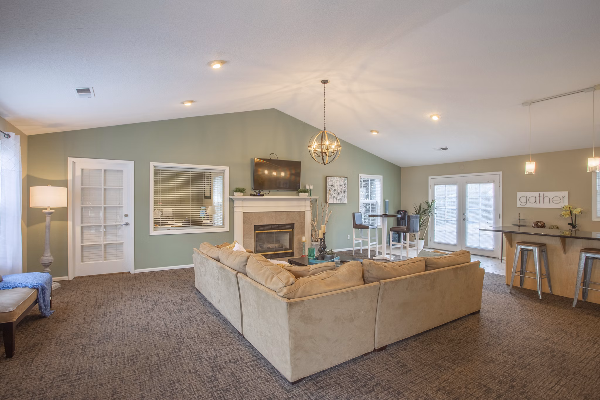 Cozy living room with modern furnishings at Larkspur Place Apartments, featuring natural light and open layout