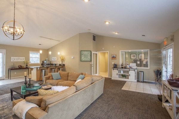Spacious living room featuring modern decor at Larkspur Place Apartments