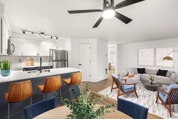 Dining area with elegant wooden furnishings at Sedona at Bridgecreek Apartments