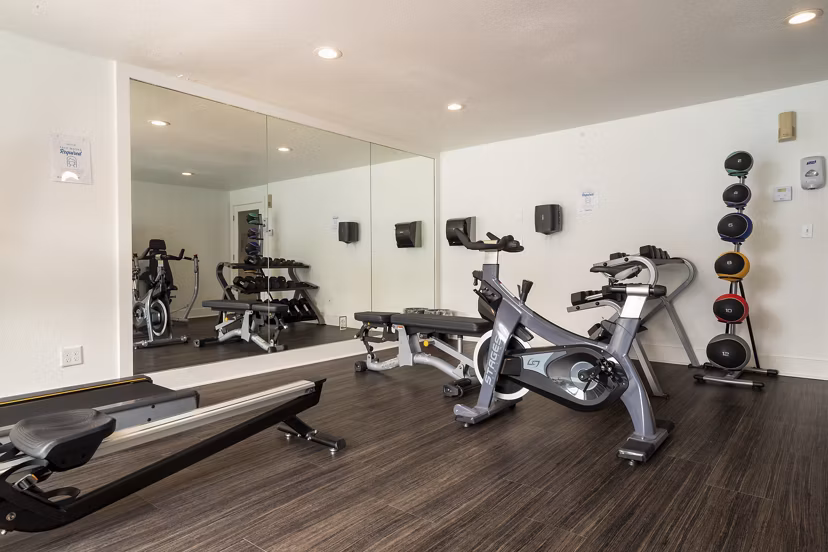 State-of-the-art fitness center at Sedona at Bridgecreek Apartments, featuring modern equipment for residents' wellness and exercise needs